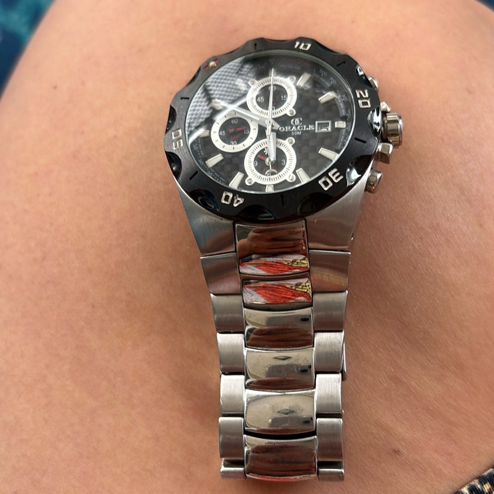 Oracle watch…used…needs battery